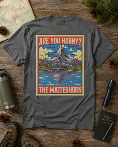 Are You Horny? Matterhorn graphic tee displayed on an outdoor hiking flat lay